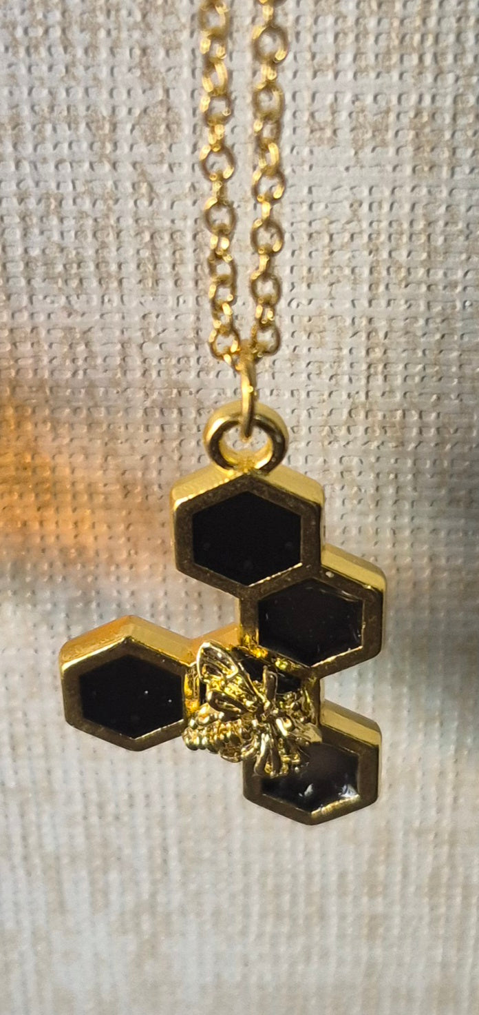Black resin honeycomb and bee necklace (5 honeycomb long)