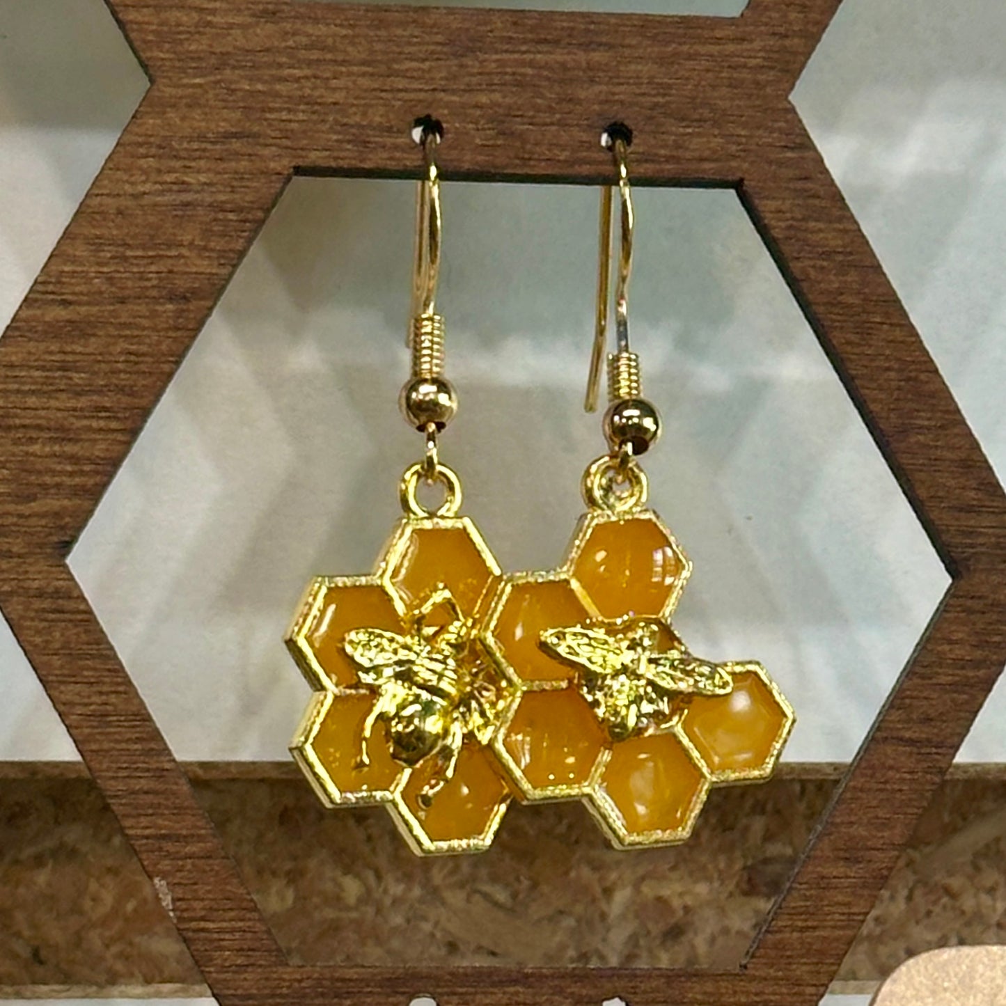 Orange honeycomb earrings with bee (6 hex)