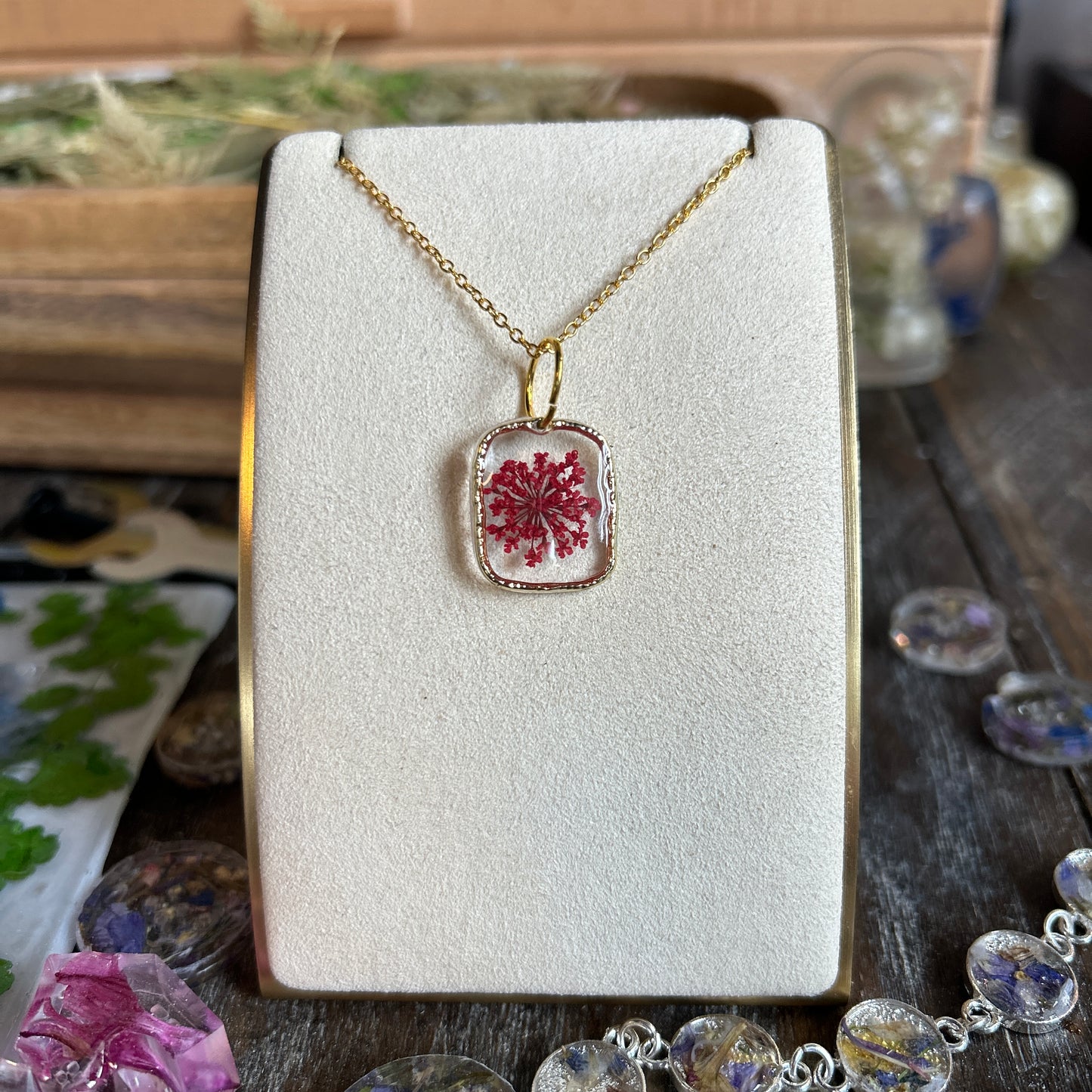Gold pendent pink flower