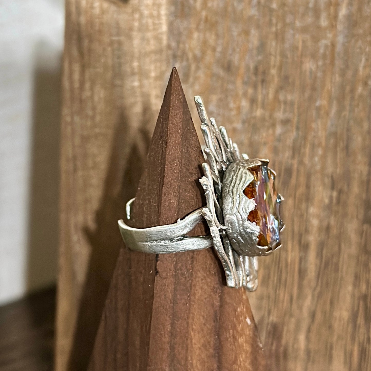 Autumn botanical ring in a wavy, silver setting