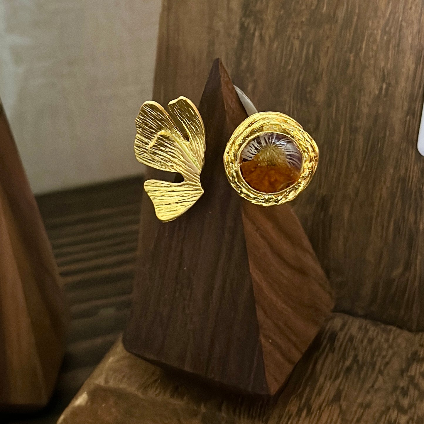 Autumn botanical ring in a golden wrap setting