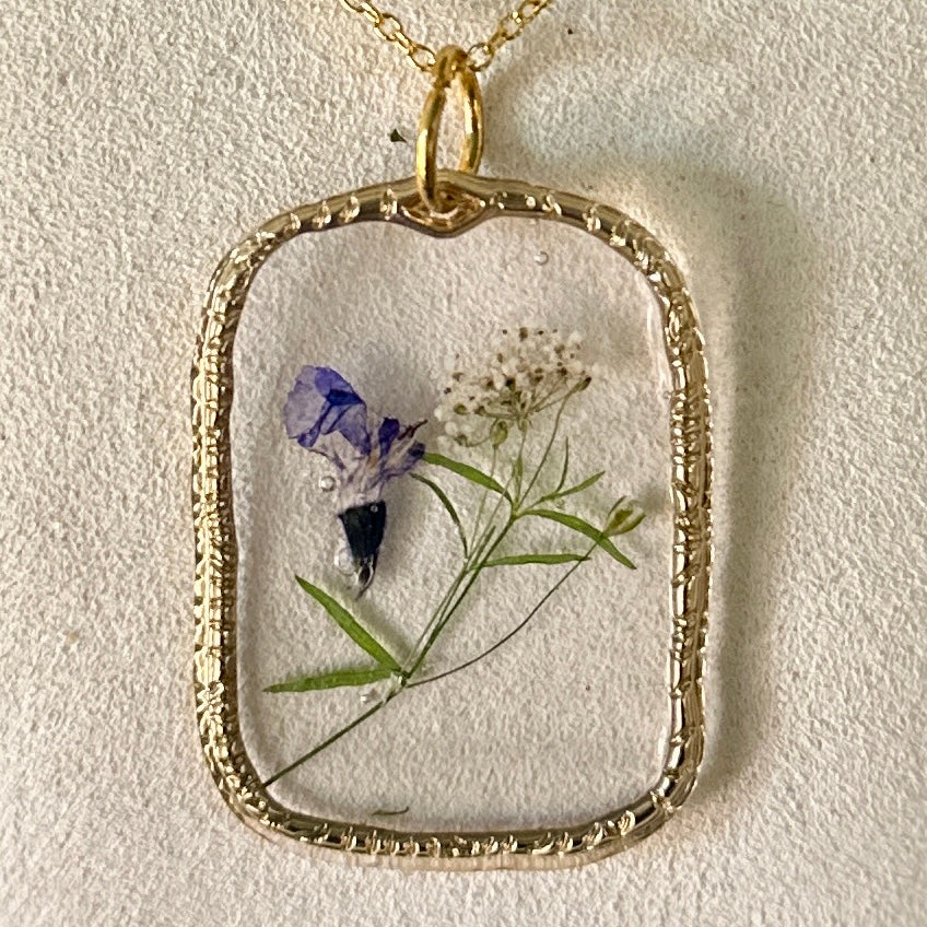 Gold-framed botanical necklace (violet, white, and green) 4