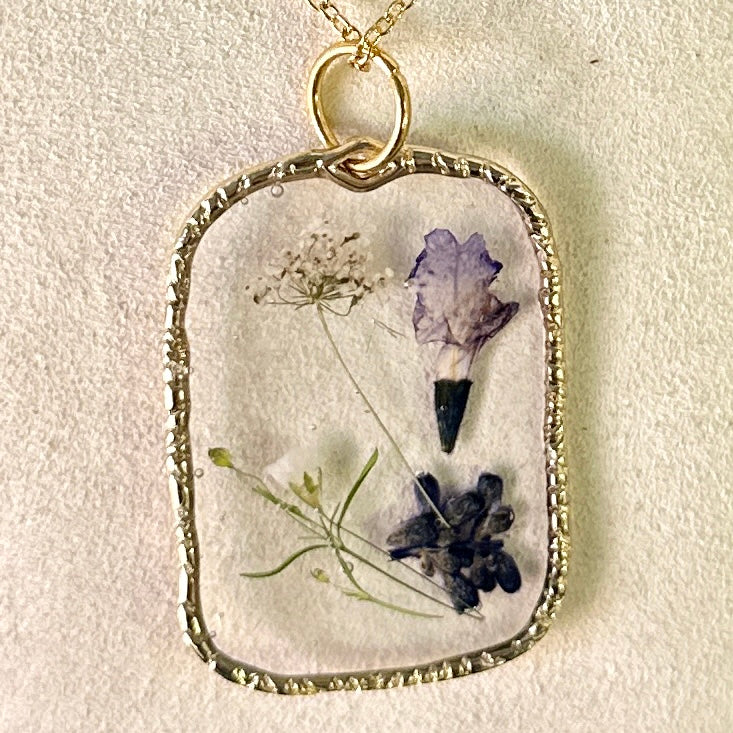 Gold-framed botanical necklace (violet and white) 1