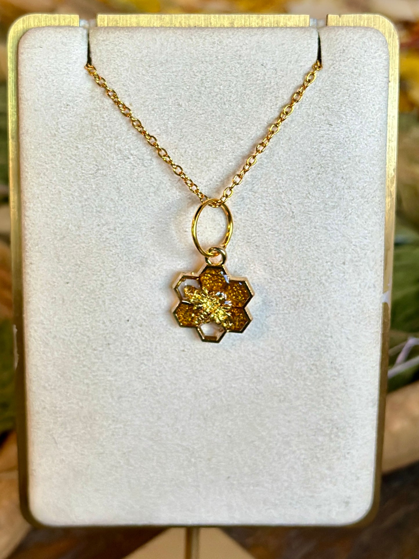 Golden and clear honeycomb and Bee necklace (7 hex)