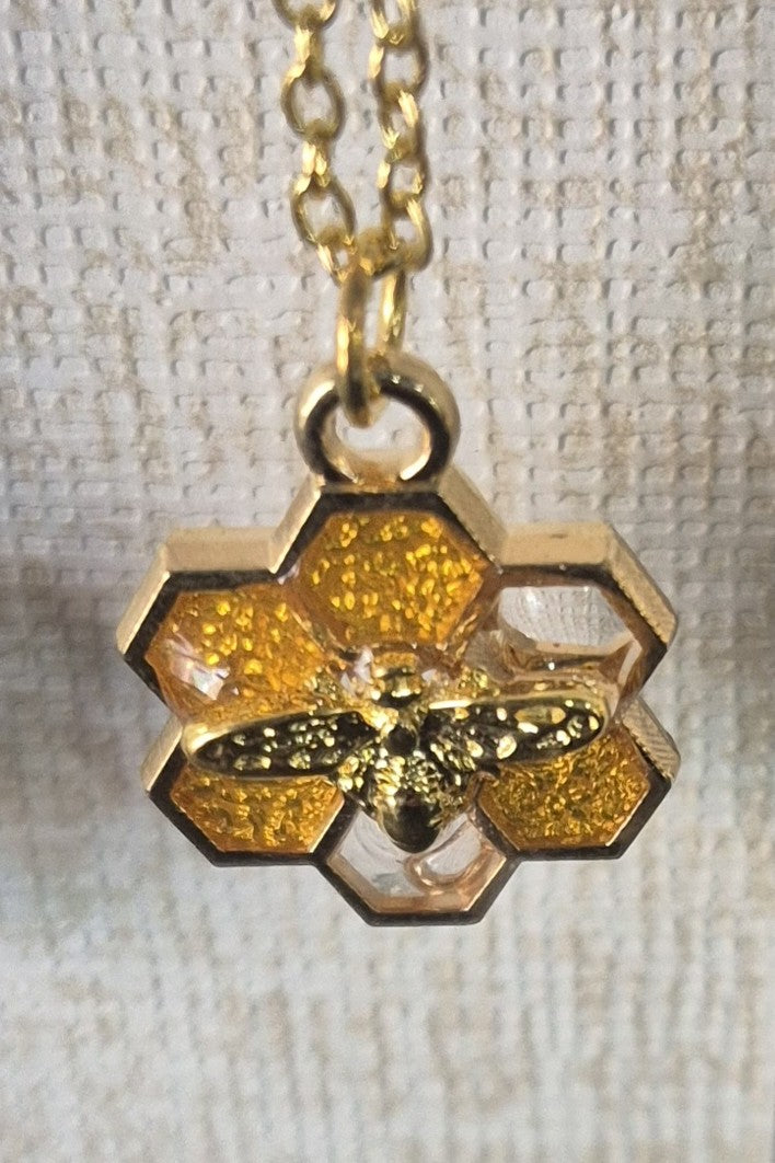 Clear  and amber resin honeycomb and bee necklace and earring (6 c)