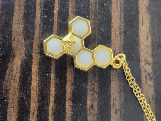 White resin honeycomb and bee necklace (5 honeycomb long)