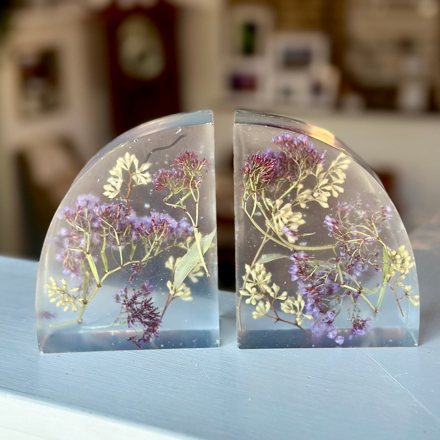 Purple and white botanical resin bookends