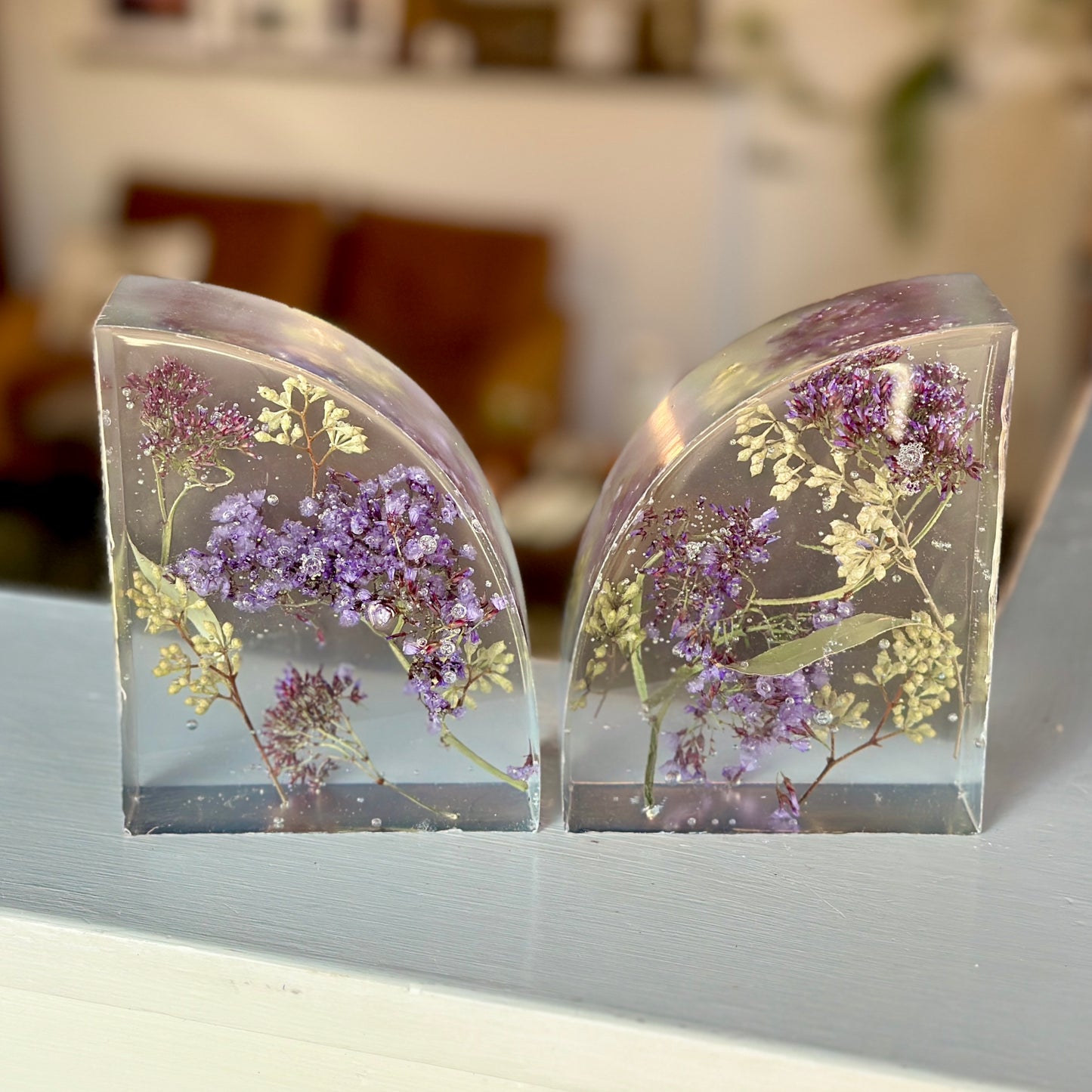 Purple and white botanical resin bookends