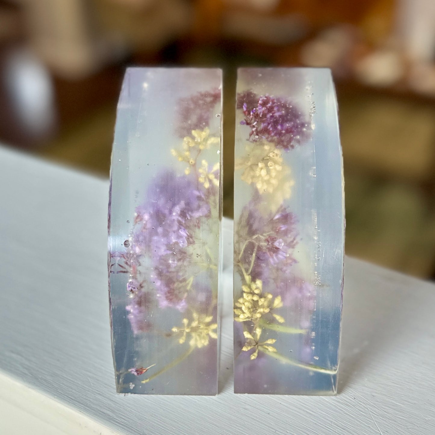 Purple and white botanical resin bookends