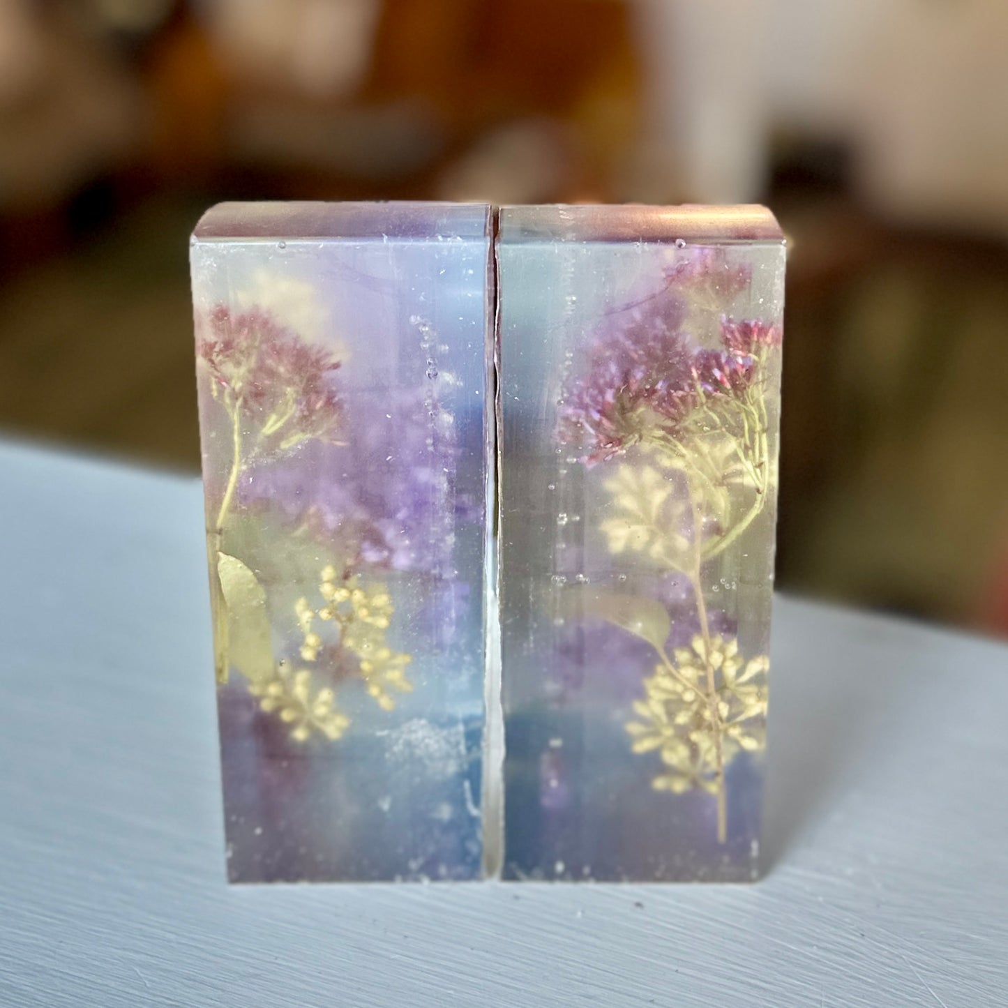 Purple and white botanical resin bookends
