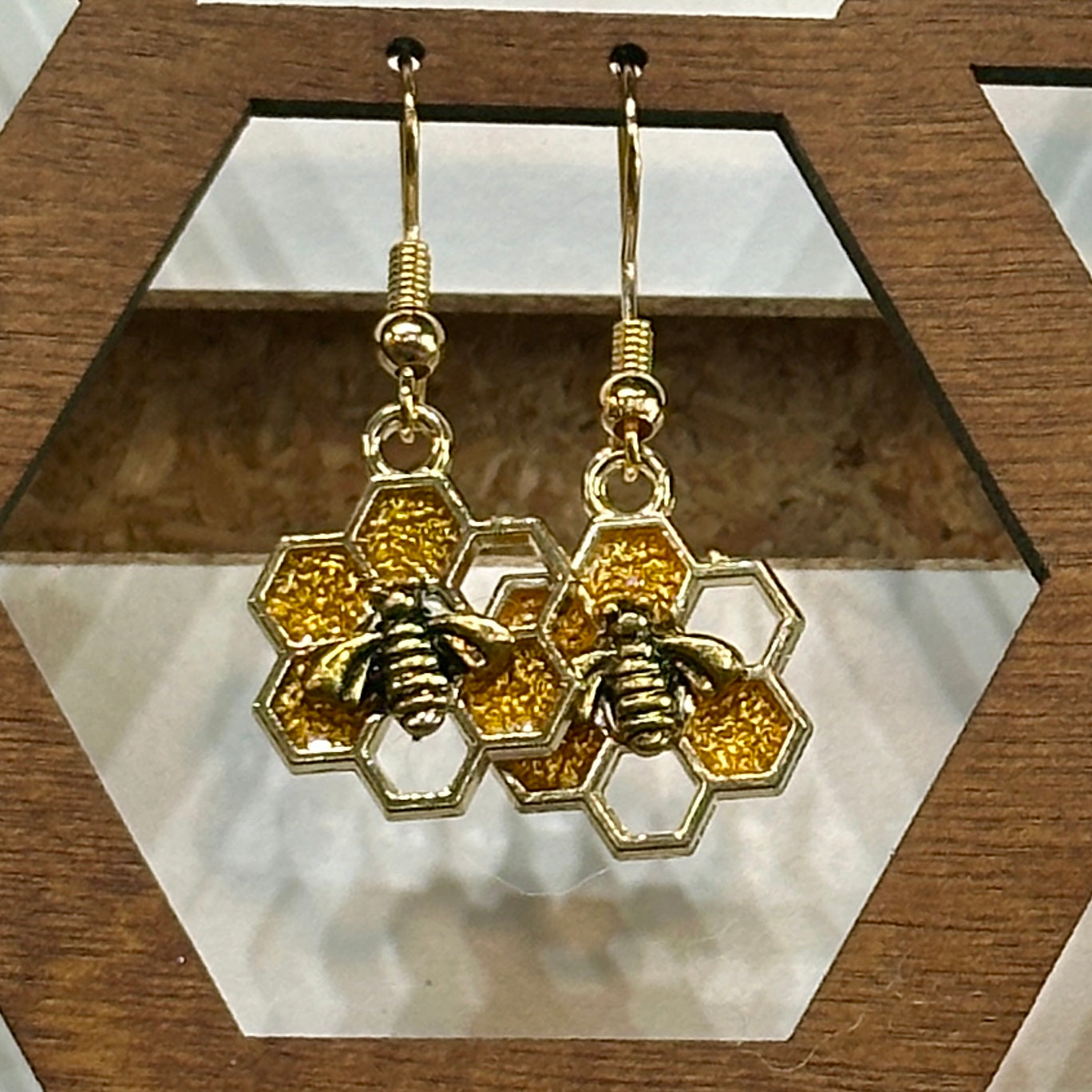 Gold and clear honeycomb earrings with large bee (7 hex)