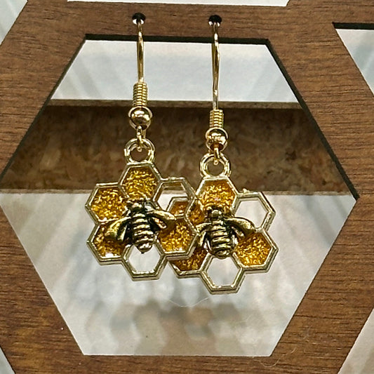 Gold and clear honeycomb earrings with large bee (7 hex)