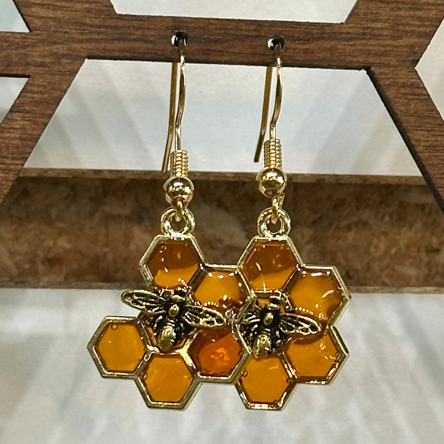 Amber honeycomb earrings with large bee (6 hex)