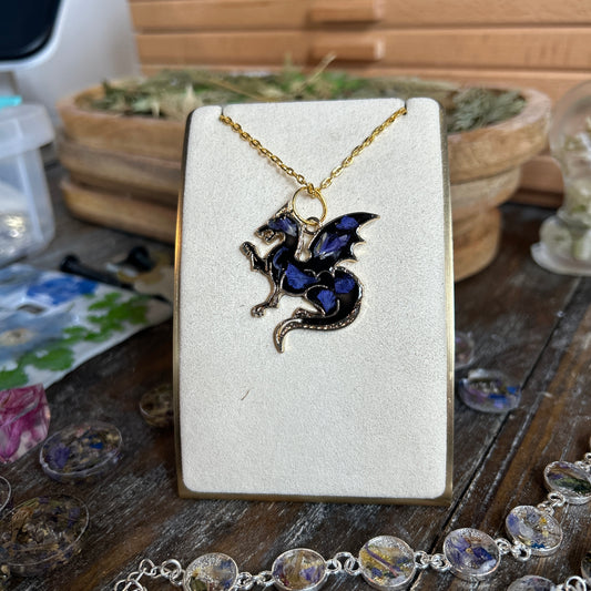 Gold dragon pendent with black resin