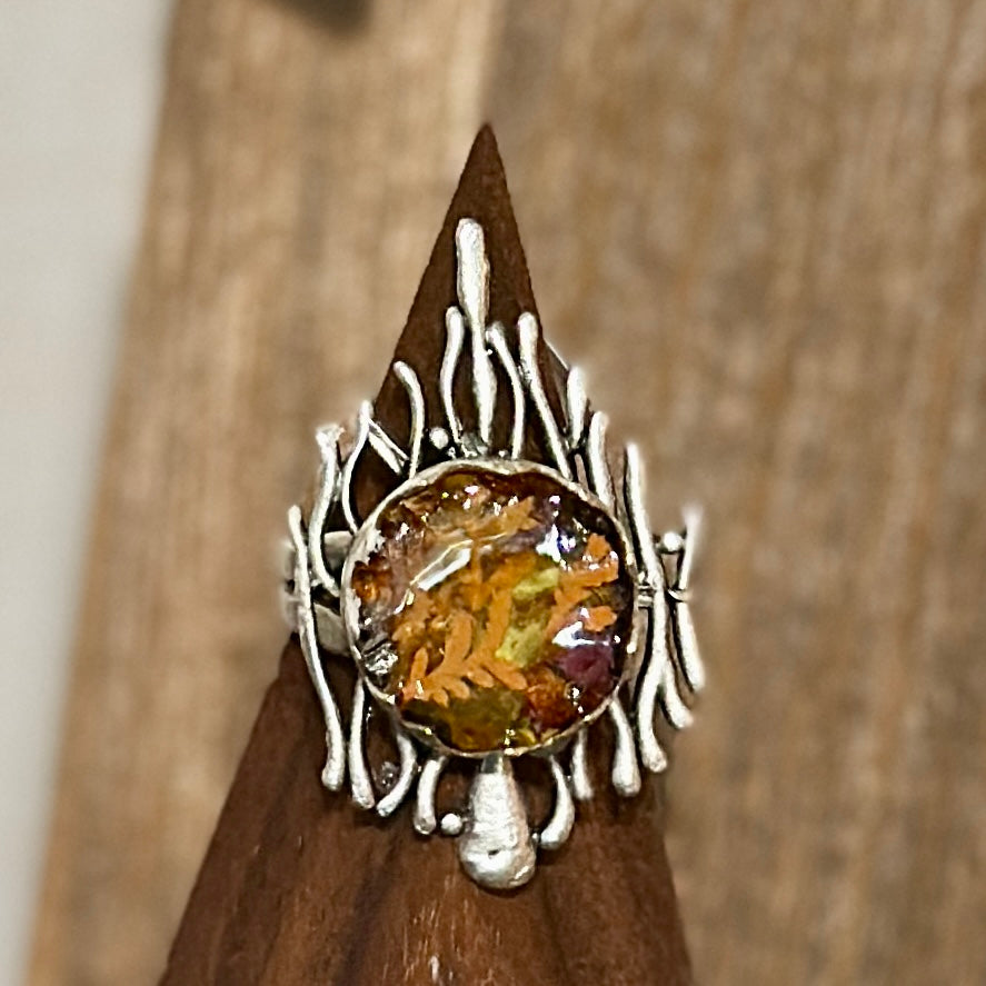 Autumn botanical ring in a wavy, silver setting