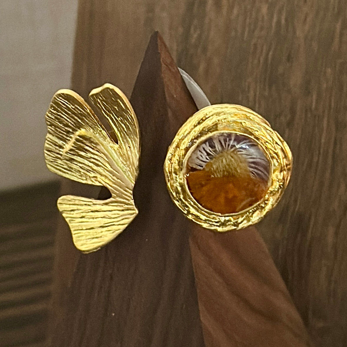 Autumn botanical ring in a golden wrap setting