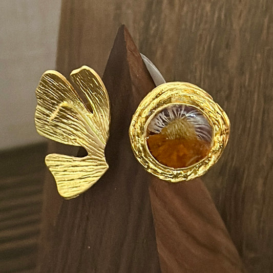 Autumn botanical ring in a golden wrap setting