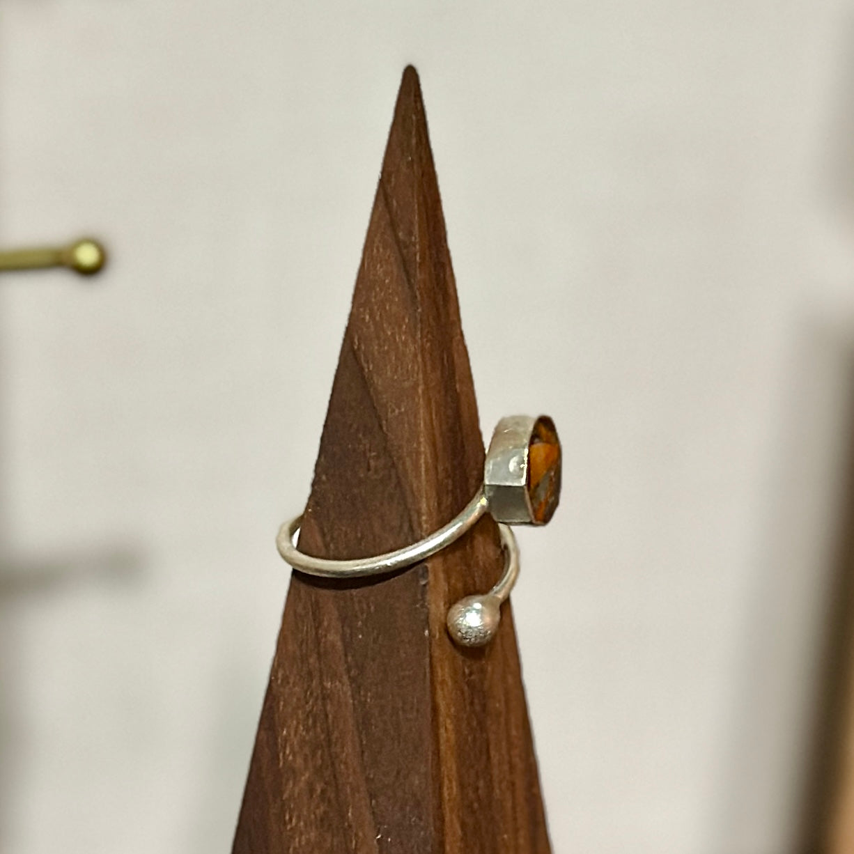 Autumn botanical ring in silver spiral setting