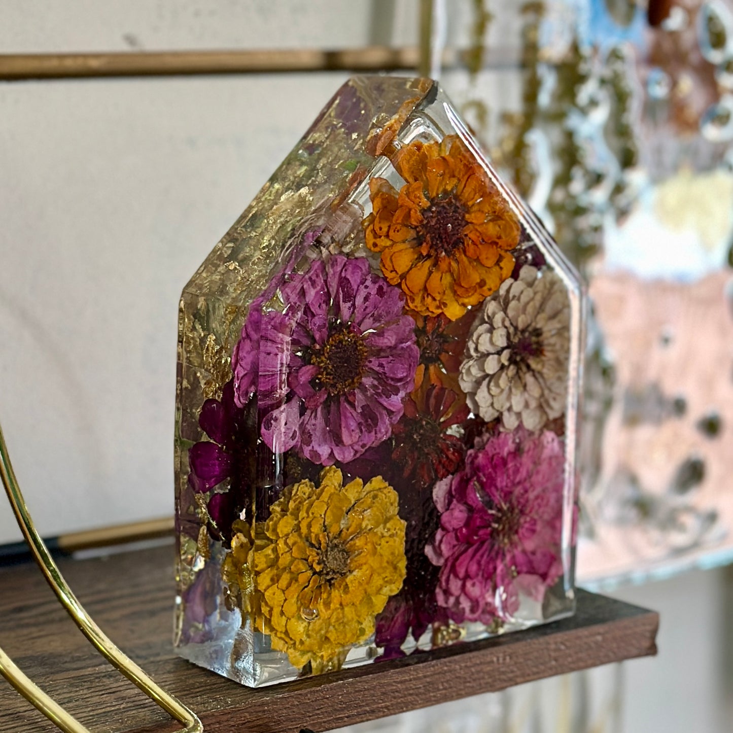 Zinnia and gold resin house