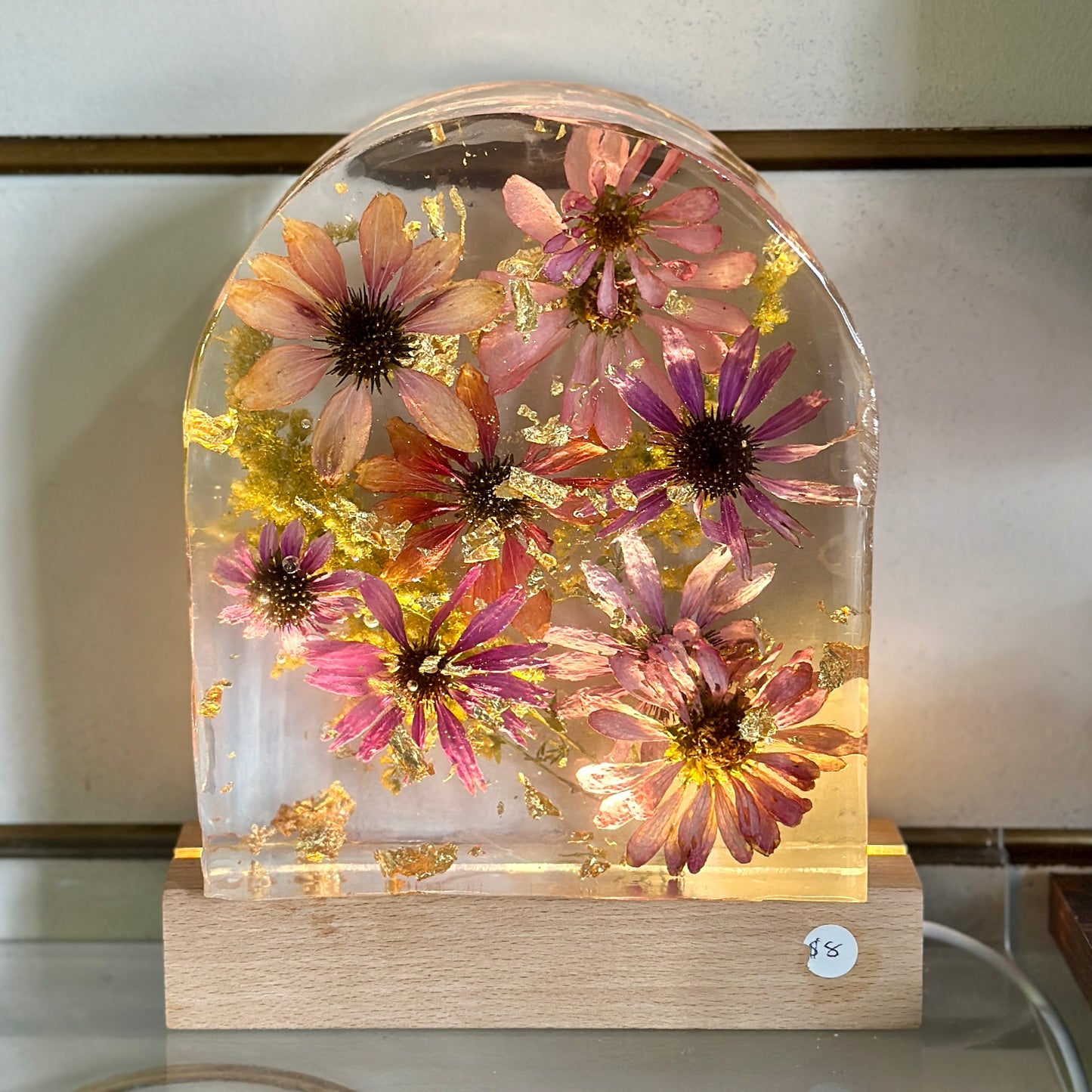 Zinnia and gold resin arch