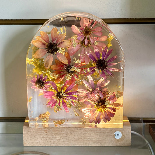 Zinnia and gold resin arch