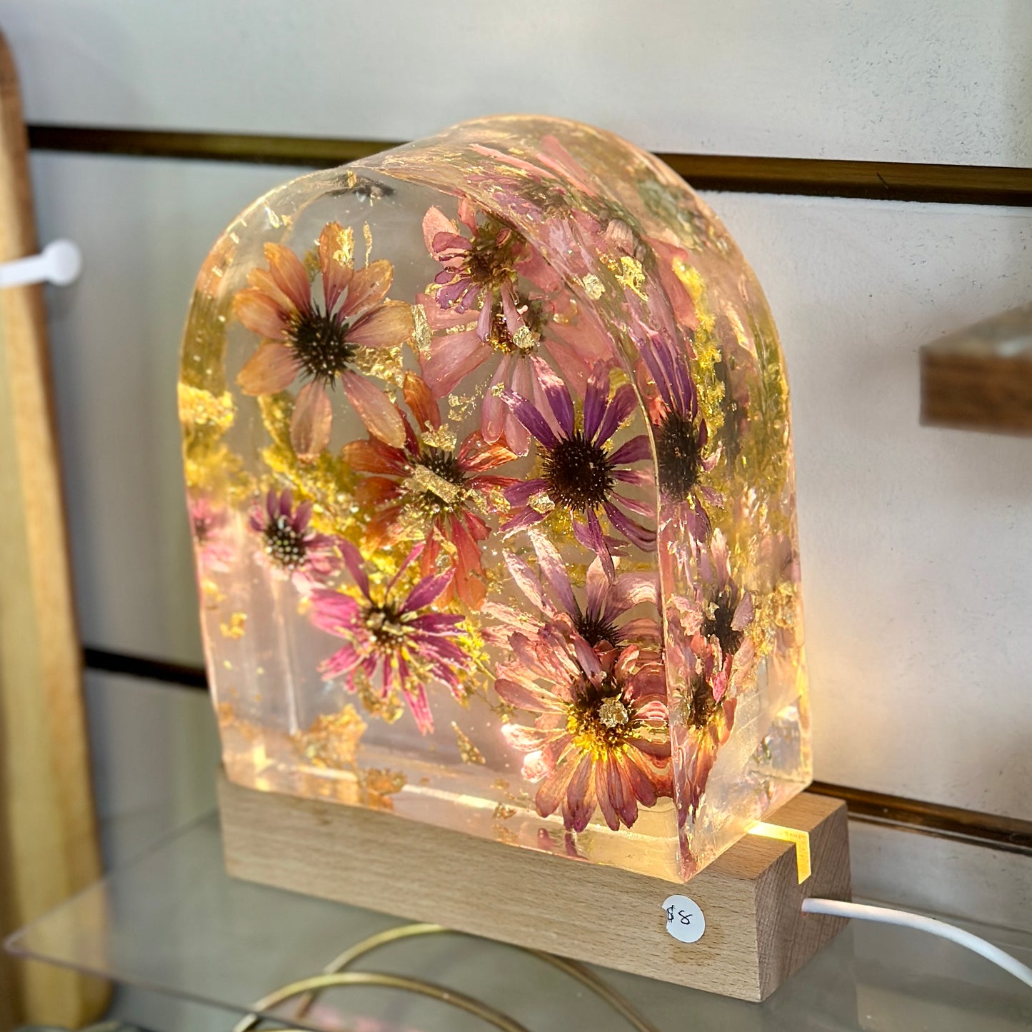 Zinnia and gold resin arch