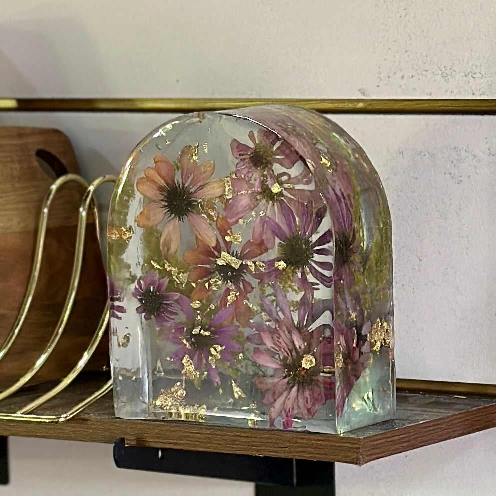 Zinnia and gold resin arch