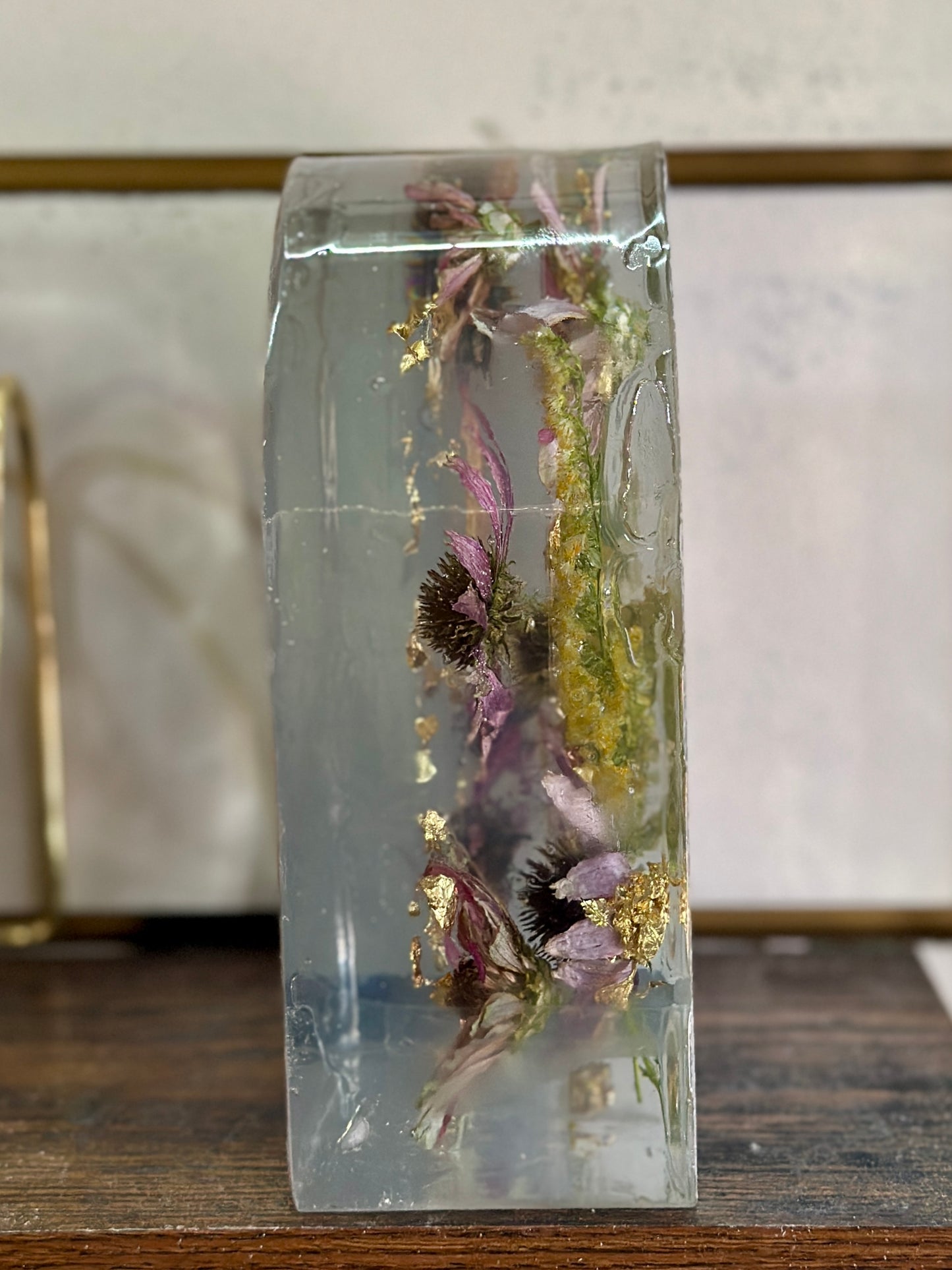 Zinnia and gold resin arch