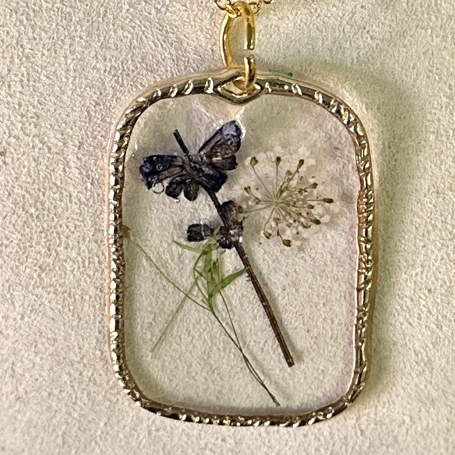 Gold-framed botanical necklace (violet, green, and white) 2