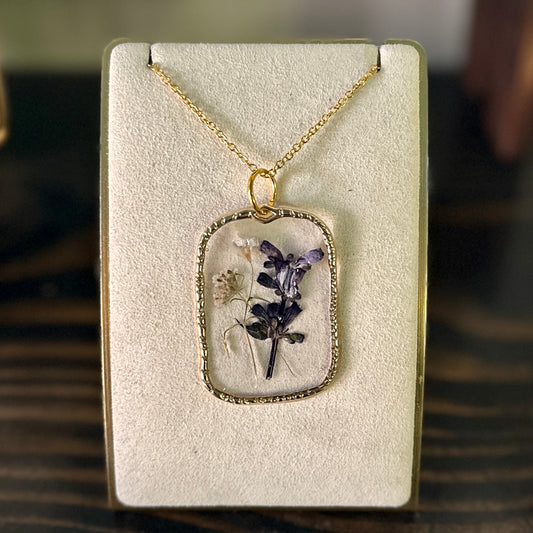 Gold-framed botanical necklace (violet and white) 2
