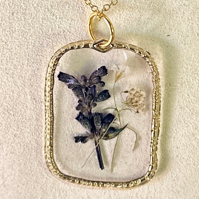 Gold-framed botanical necklace (violet and white) 2