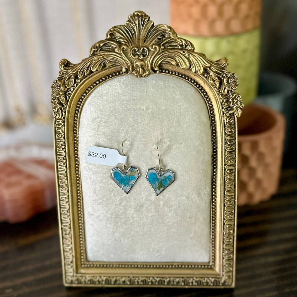 Silver-framed heart-shaped botanical earrings (pair 1)