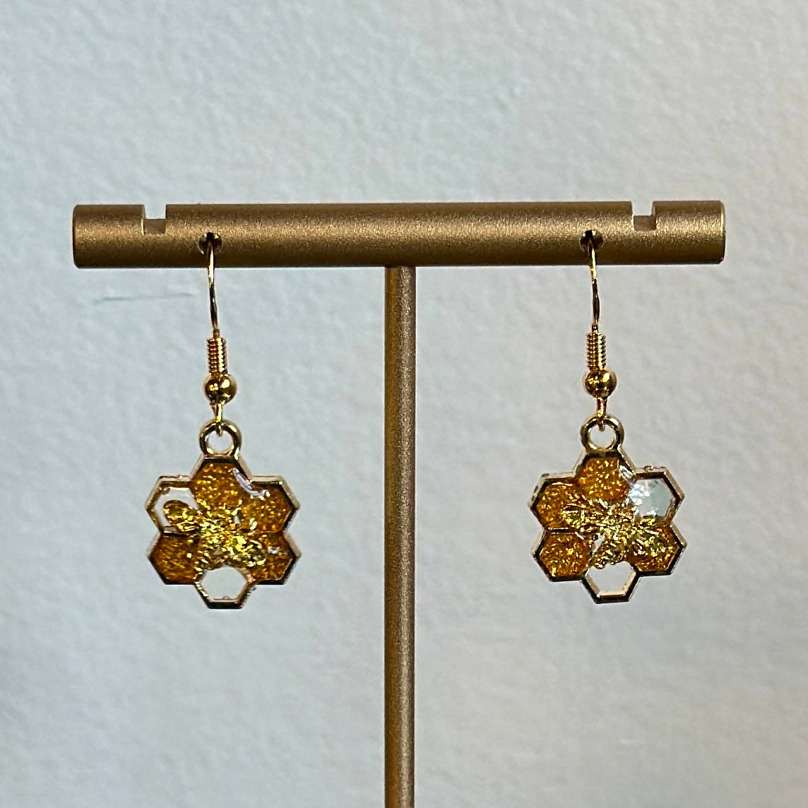 Gold and clear honeycomb and bee earrings (7 hex)