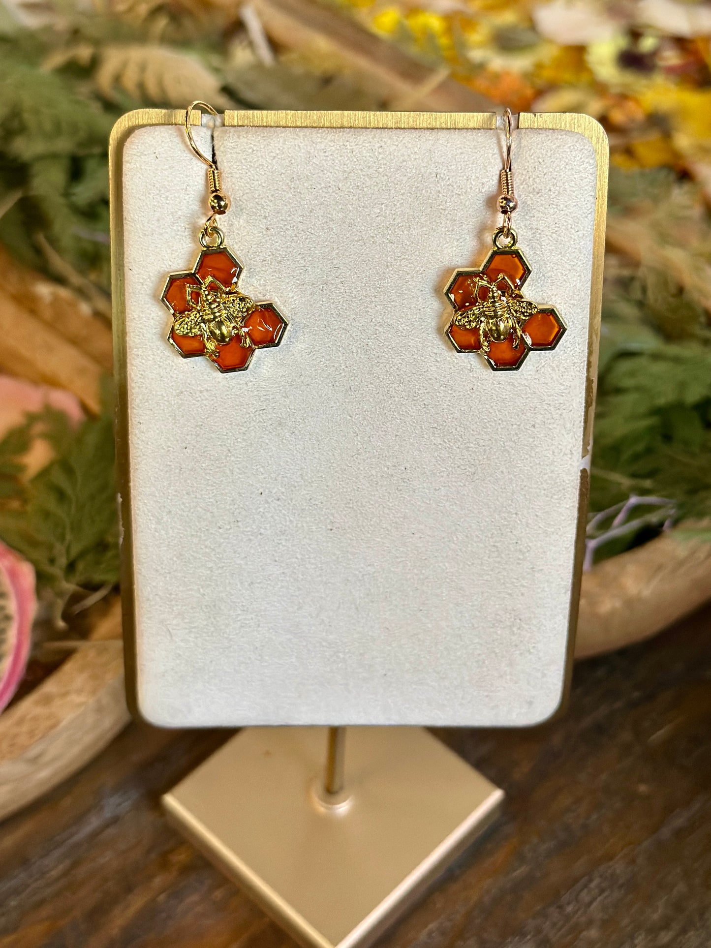Orange honeycomb and bee earrings (7 hex)